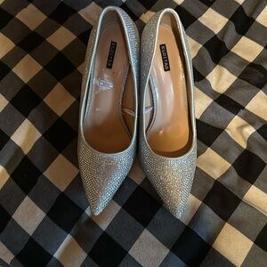 Siver sparkley high heels warn one time 81/2s